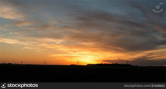 Sunset over a prairie field, Manitoba, Canada
