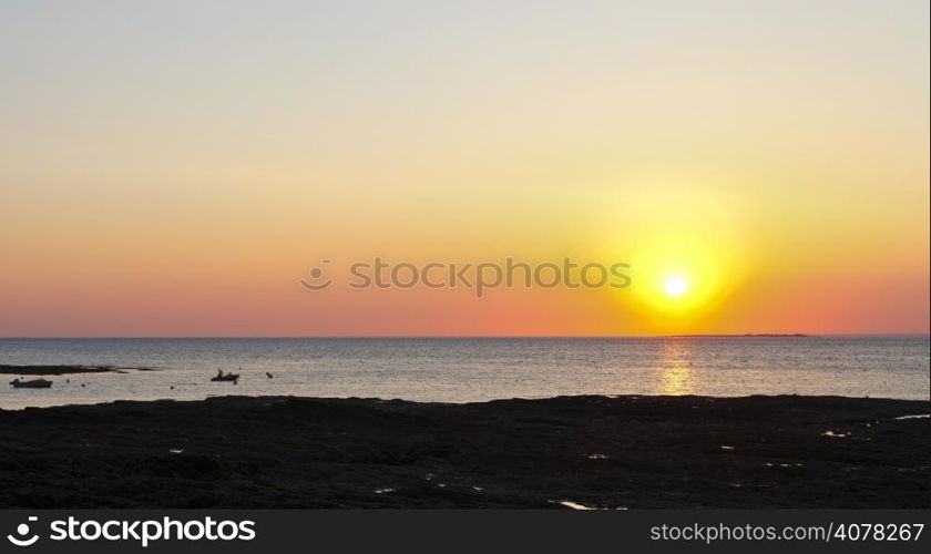sunset over Atlantic ocean near Piriac-sur-Mer town on Guerande Peninsula, France