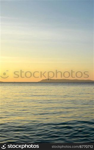sunset over beach in Asia