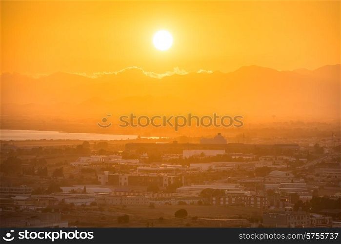 Sunset over european city. Cagliari, Sardinia, Italy.