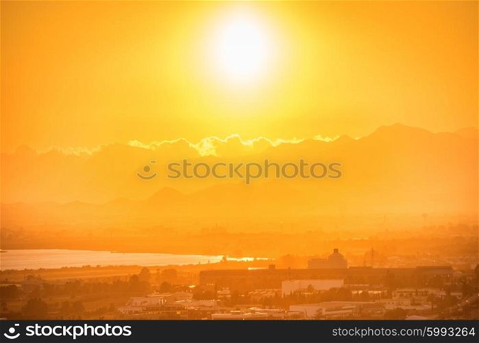 Sunset over european city. Cagliari, Sardinia, Italy.