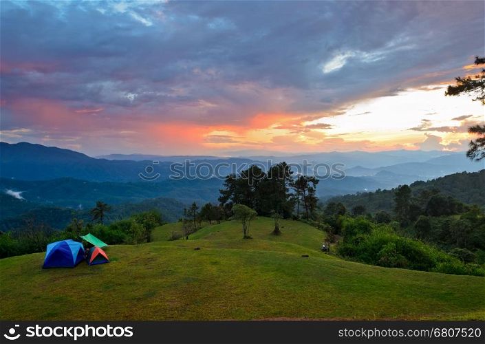 Sunset over hills at campsite on the high mountain in Huai Nam Dang national park, Chiang Mai and Mae Hong Son province of Thailand