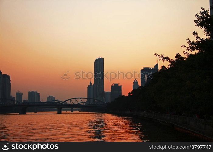 Sunset over Pearl river. Summertime evening in Guangzhou
