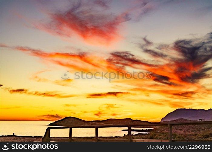 Sunset over sea. Seaside evening landscape. Calblanque Beach, Murcia Spain.. Sunset over sea, Calblanque beach, Spain