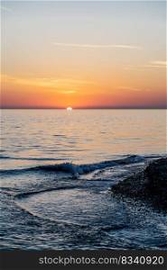 Sunset over the sea. A beautiful natural sunset landscape that will definitely come in handy.. Beautiful sunset landscape on the blue sea.