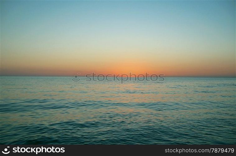 Sunset over the Sea at the evening