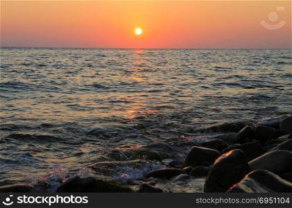 Sunset Over The Sea. Evening on the seashore. Black sea seaside
