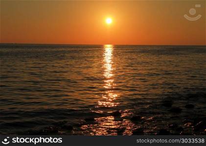 Sunset Over The Sea. Evening on the seashore. Black sea seaside. Sunset Over The Sea. Evening. Black sea seaside