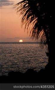 Sunset over the sea, Pakini Nui Wind Project, South Point, Big Island, Hawaii Islands, USA