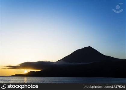 Sunset over the volcano of Pico island, Azores