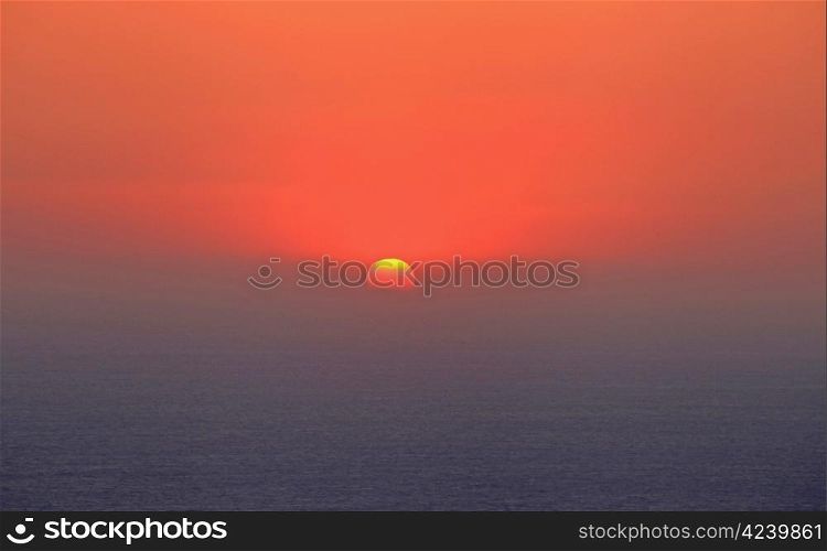 Sunset over the west coast of rhodes near monolithos