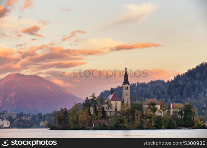 Sunset scene of Bled lake in Slovenia, famous and popular travel destination. Picturesque Slovenia, Bled lake and town in the evening