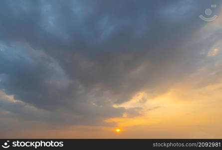 Sunset sky. Abstract nature background. Dramatic blue with orange colorful clouds in twilight time.