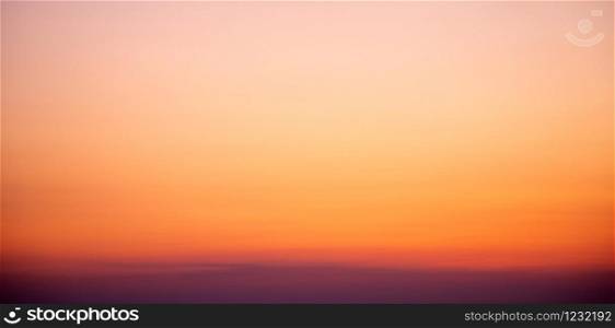 sunset sky background in orange colours