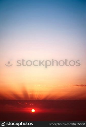 Sunset sky background, red sun down, beauty of nature, amazing panoramic view with copy space