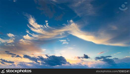 sunset sky background with tiny clouds