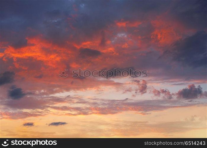 sunset sky in orange and blue. sunset sky in orange and blue blackground