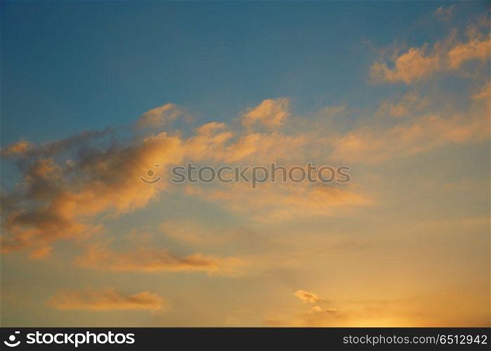 Sunset sky orange clouds on blue sky. Sunset sky orange clouds on blue sky at dusk