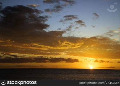 Sunset sky over the Pacific Ocean in Kihei, Maui, Hawaii, USA.