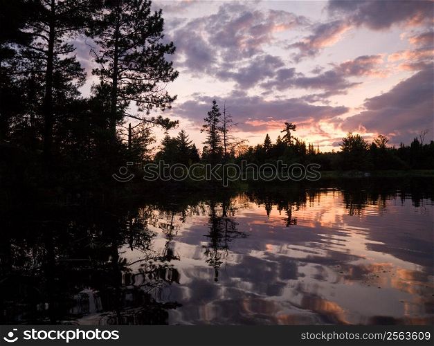 Sunset sky reflected in Lake of the Woods