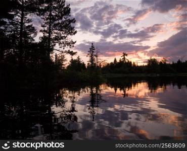 Sunset sky reflected in Lake of the Woods