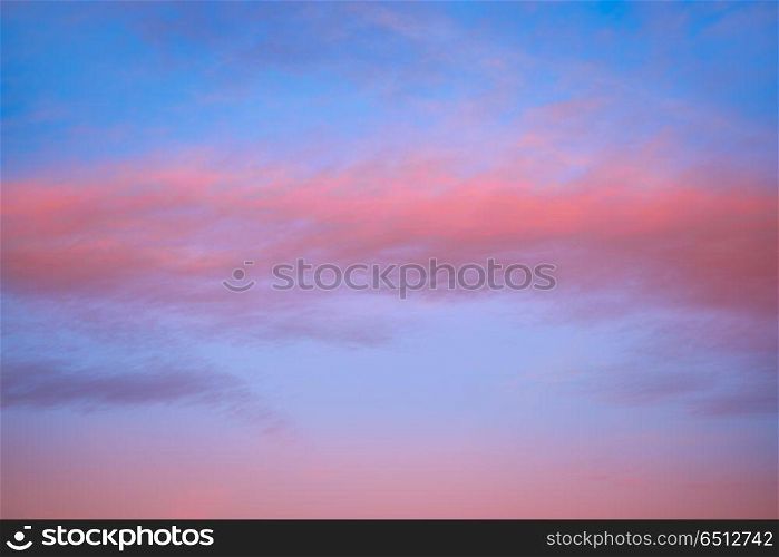 Sunset sky with orange clouds and blue skies. Sunset sky with orange clouds and blue background skies