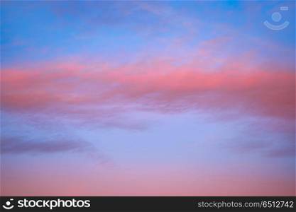 Sunset sky with orange clouds and blue skies. Sunset sky with orange clouds and blue background skies