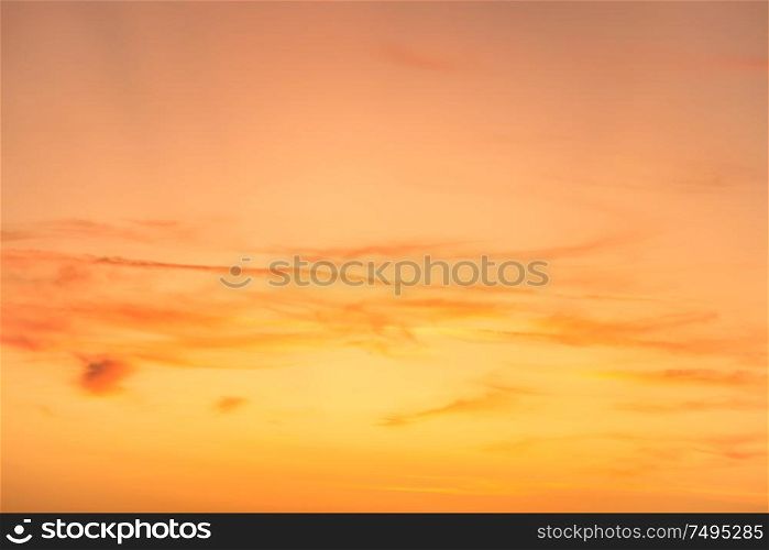 Sunset sky with red clouds and sun rays