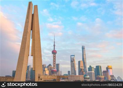 Sunset skyline of Shanghai metropolis with modern architecture and famous tv tower, China