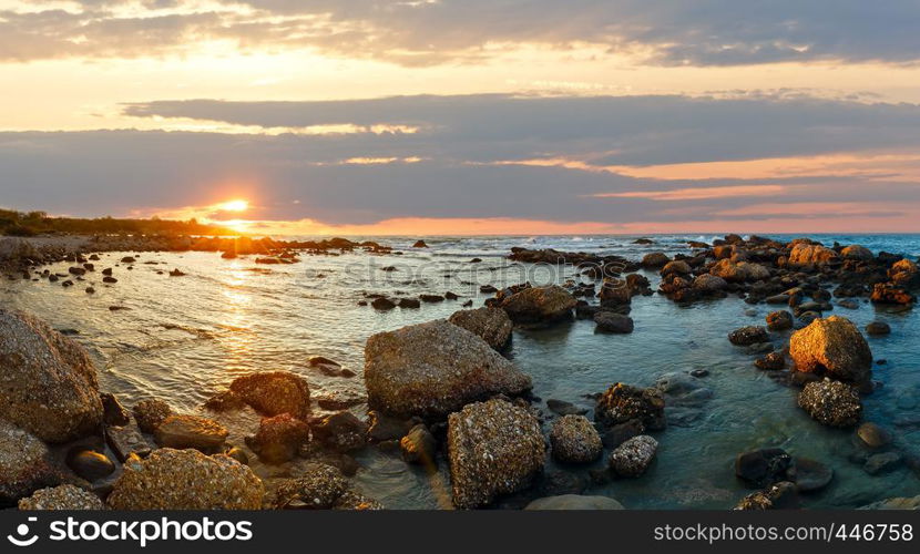 Sunset view from beach. Summer coastline, Greece, Lefkada