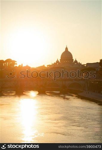 Sunset view of Tiber river and St. Peter&rsquo;s cathedral. Vatican, Rome