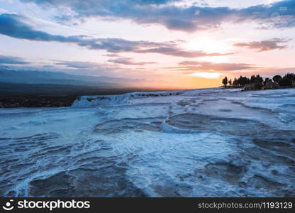 Sunset view Pamukkale tranvanter pools at ancient Hierapolis , Denizli