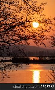 Sunset with big sun Radolfzell on the beautiful Lake Constance
