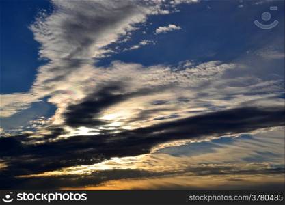Sunset with clouds sky over nature area De Vlietlanden, The Netherlands.