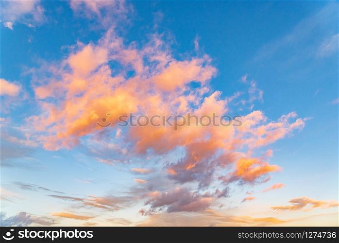 Sunset with dramatic sky and colorful clouds. Background. Sunset with dramatic sky and colorful clouds