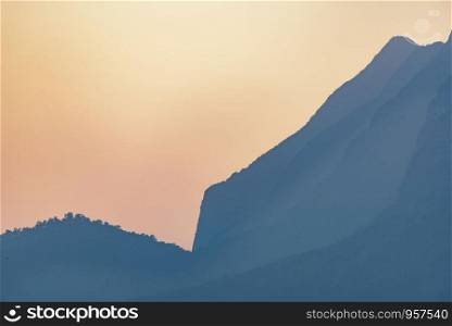 sunset with the mountain layers, tropical forest, Asian mountain