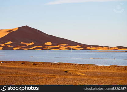 sunshine in the desert of morocco sand and lake dune