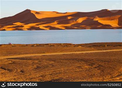 sunshine in the desert of morocco sand and lake dune