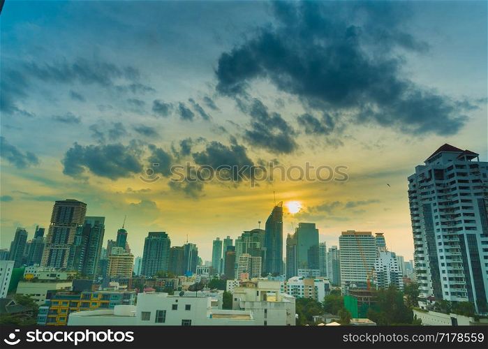 Sunshine morning time of Bangkok city. Bangkok is the capital and the capital city of Thailand. Cityscape with white cloud and blue sky in a sunshine day.