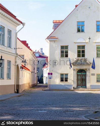 Sunshine street scene with typical architecture of Tallinn old town, Estonia