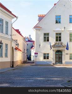 Sunshine street scene with typical architecture of Tallinn old town, Estonia