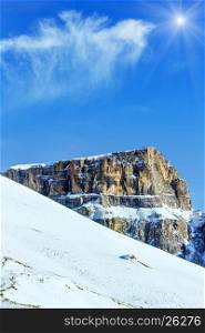 Sunshiny winter mountain landscape (Sella Pass , Italy).