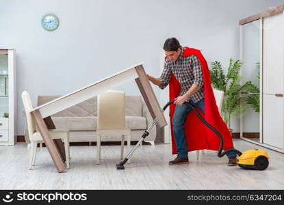 Super hero cleaner working at home