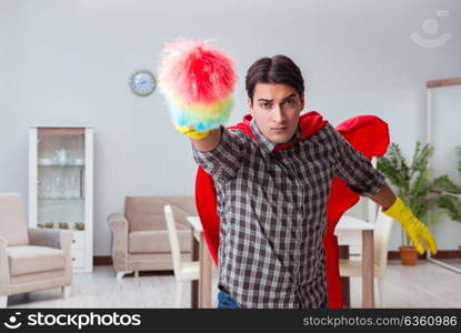 Super hero cleaner working at home