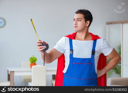 Super hero repairman working at home