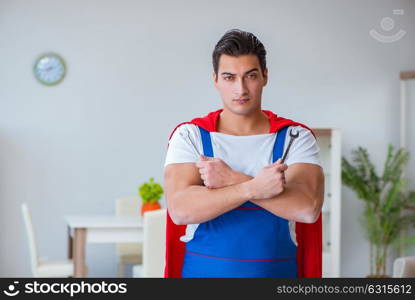 Super hero repairman working at home