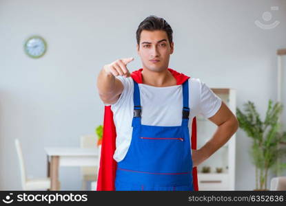 Super hero repairman working at home