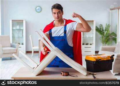 Super hero repairman working at home