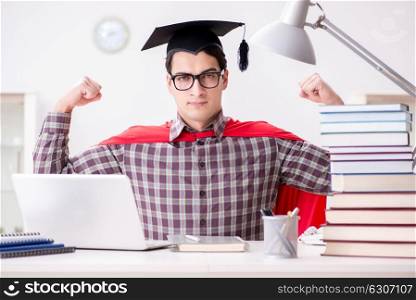 Super hero student wearing a mortarboard studying for exams