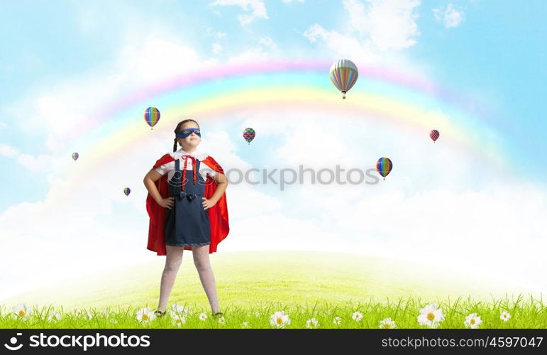 Super kid. Girl of school age in super hero costume